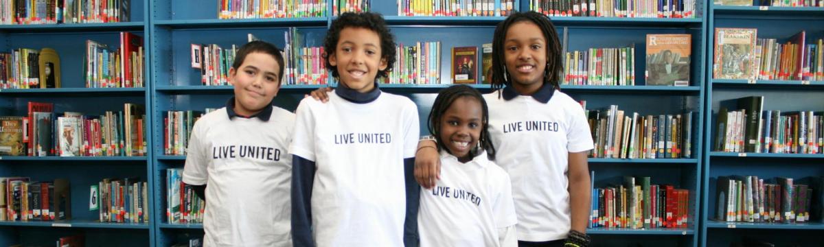 Four students in live united attire